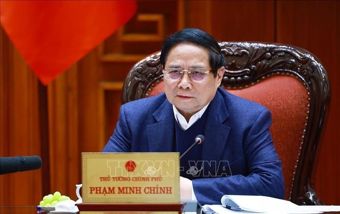 Thủ tướng Phạm Minh Ch&iacute;nh chủ tr&igrave; cuộc họp. Ảnh: Dương Giang/TTXVN