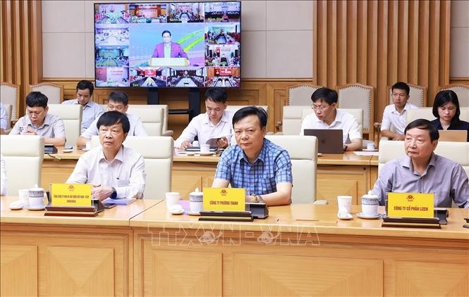 Đại diện c&aacute;c ng&agrave;nh, nh&agrave; thầu, ban quản l&yacute; dự &aacute;n tham dự cuộc họp. Ảnh: Dương Giang/TTXVN