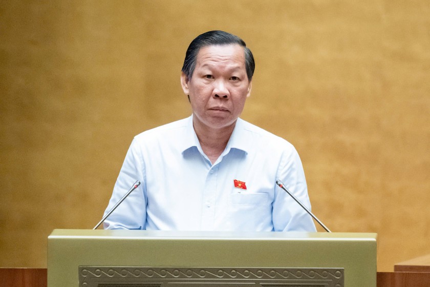 Chủ nhiệm Ủy ban Kinh tế v&agrave; T&agrave;i ch&iacute;nh Phan Văn M&atilde;i b&aacute;o c&aacute;o thẩm tra. (Ảnh: Cổng TTĐTQH)