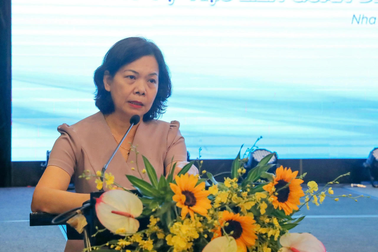 B&agrave; Vũ Ngọc Lan, Vụ ph&oacute; Vụ Ph&aacute;p chế, NHNN ph&aacute;t biểu tại Hội thảo.(Ảnh trong b&agrave;i: H.Thắng)