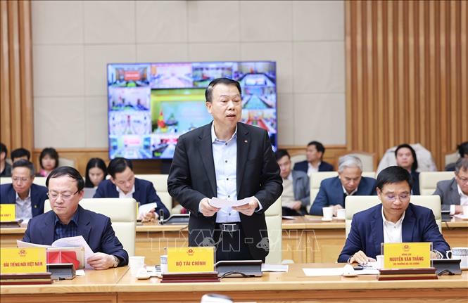 Thứ trưởng Bộ T&agrave;i ch&iacute;nh Nguyễn Đức Chi b&aacute;o c&aacute;o t&igrave;nh h&igrave;nh giải ng&acirc;n vốn đầu tư c&ocirc;ng năm 2025. Ảnh: Dương Giang/TTXVN
