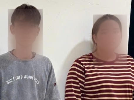 Hai đối tượng Nguyễn Hữu Ba v&agrave; Vũ Thị Hương Giang tại Cơ quan điều tra