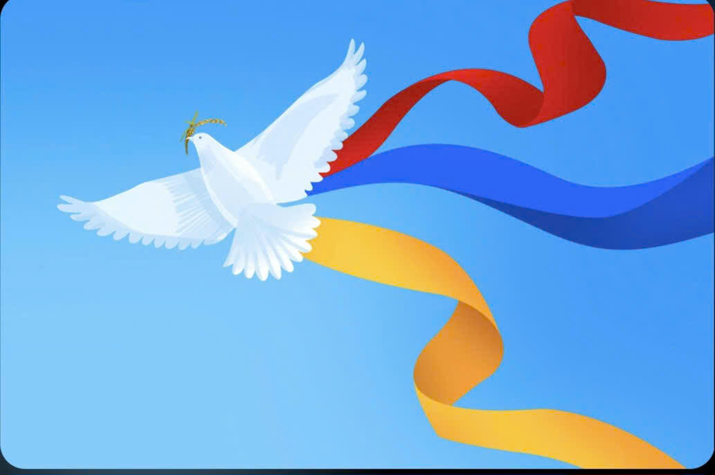 Chim bồ c&acirc;u ngậm b&ocirc;ng l&uacute;a tung c&aacute;nh, c&ugrave;ng ba dải lụa đỏ - v&agrave;ng - xanh tượng trưng cho kh&aacute;t vọng h&ograve;a b&igrave;nh, sự kết nối v&agrave; ph&aacute;t triển bền vững của Việt Nam.