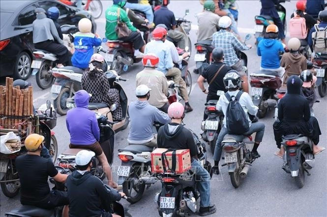 Tr&ecirc;n tuyến đường Ngọc Hồi đi trung t&acirc;m TP H&agrave; Nội, lượng người v&agrave; phương tiện gia tăng đột biến.&nbsp;(Ảnh: TTXVN)