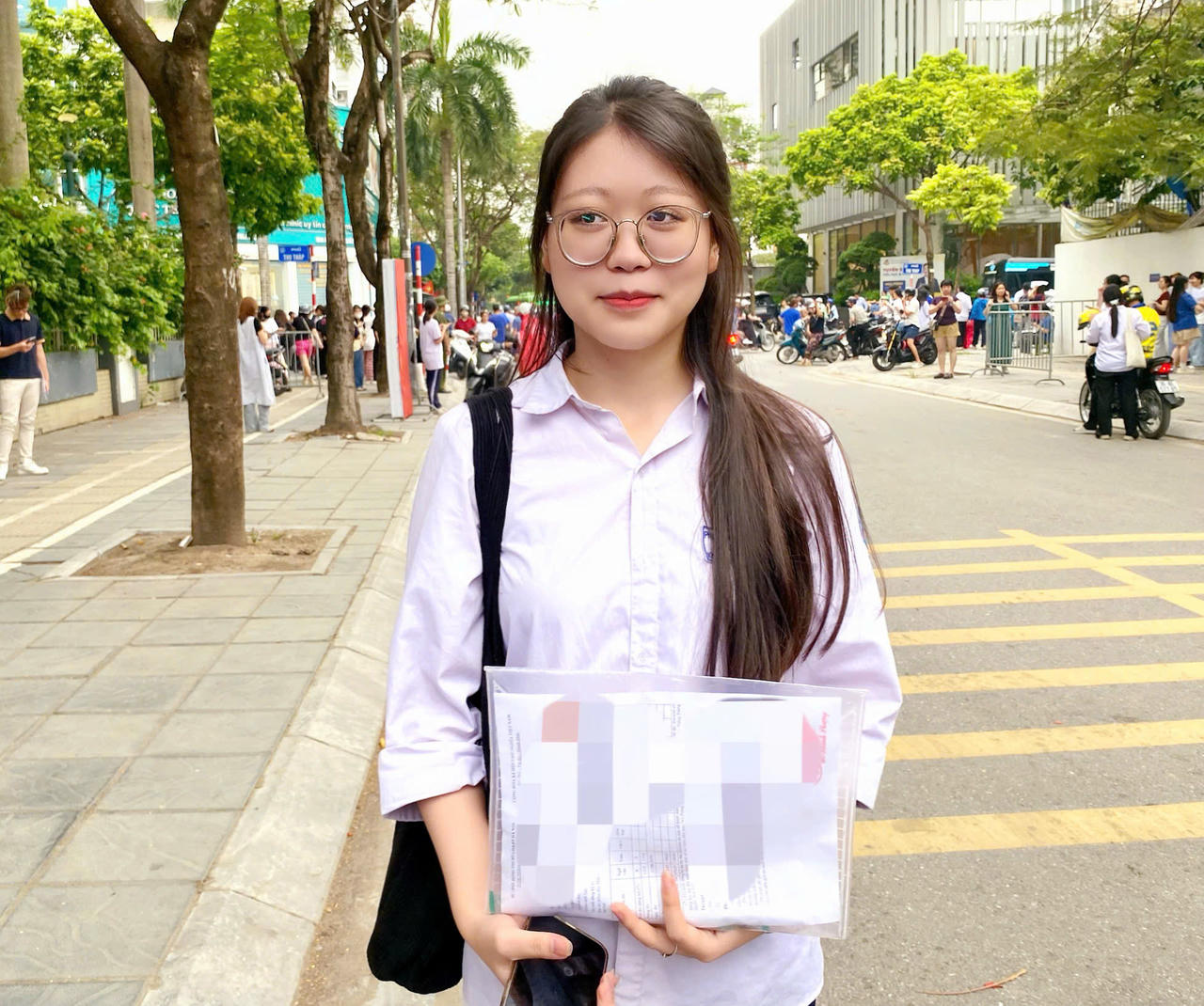Em Giang, học sinh Trường SOS&nbsp;Hermann Gmeiner, cho biết c&aacute;c c&acirc;u cơ bản của đề To&aacute;n năm nay em đ&atilde; ho&agrave;n th&agrave;nh trọn vẹn. (Ảnh: PV)