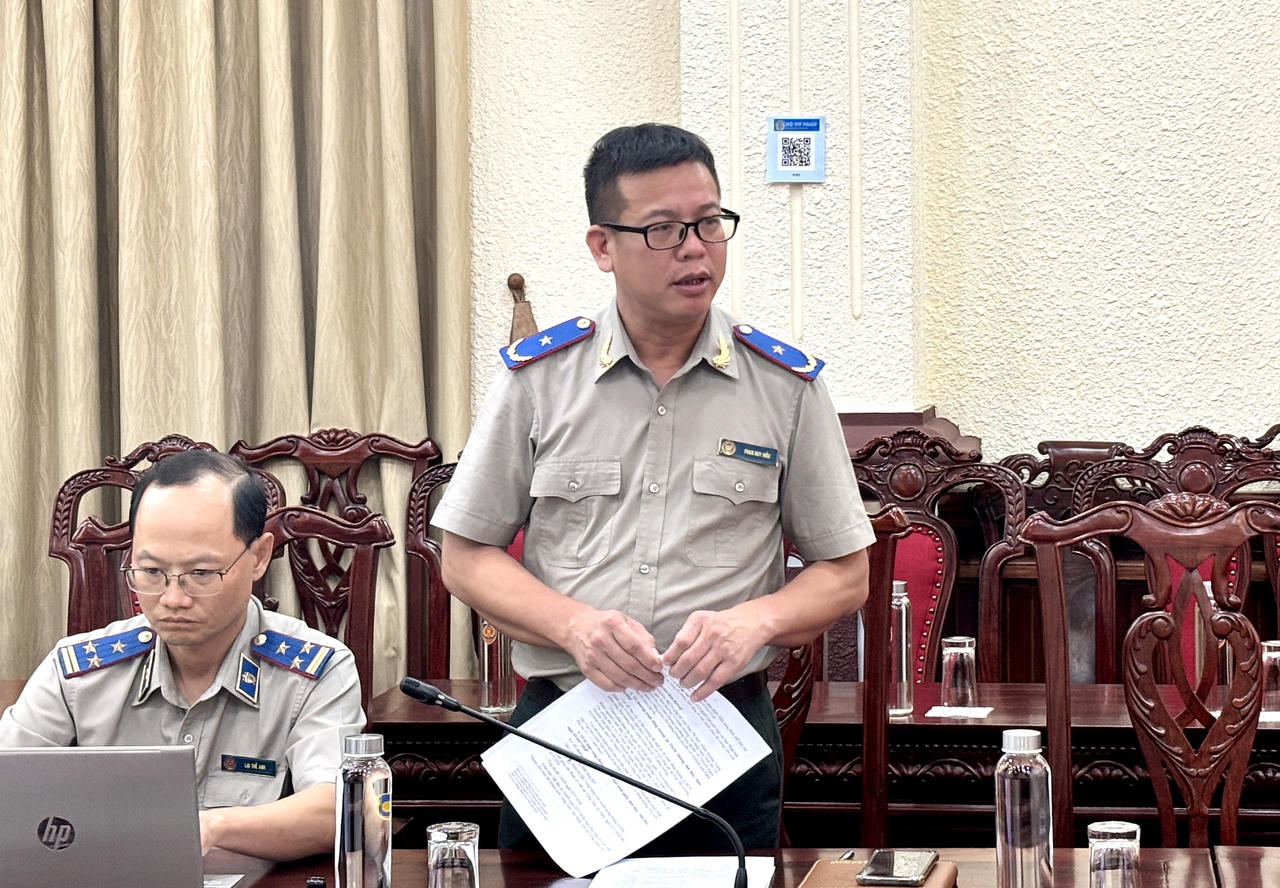 Ph&oacute; Cục trưởng Cục Quản l&yacute; THADS Phan Huy Hiếu b&aacute;o c&aacute;o tại cuộc họp.