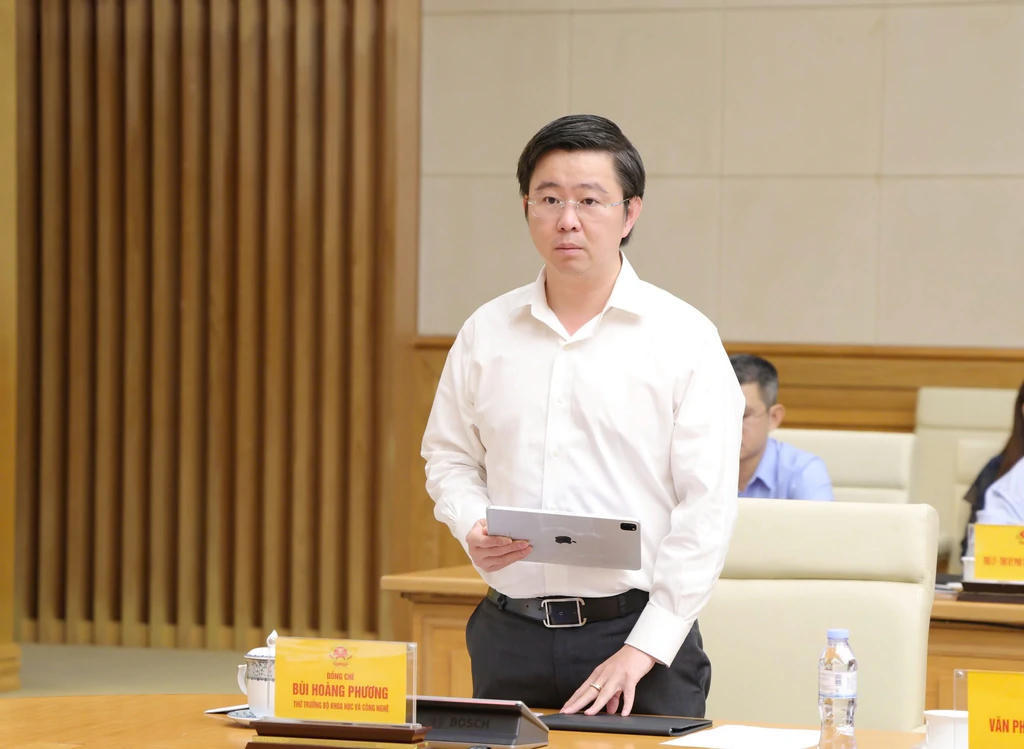 Thứ trưởng Bộ Khoa học v&agrave; C&ocirc;ng nghệ B&ugrave;i Ho&agrave;ng Phương b&aacute;o c&aacute;o tại Hội nghị. (Ảnh: MST)