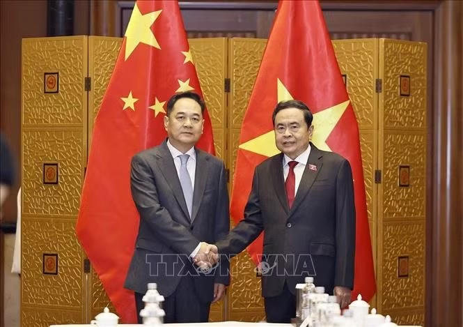 Chủ tịch Quốc hội Trần Thanh Mẫn v&agrave; Chủ tịch Hội Hữu nghị đối ngoại nh&acirc;n d&acirc;n Trung Quốc Dương Vạn Minh. Ảnh: Do&atilde;n Tấn/TTXVN